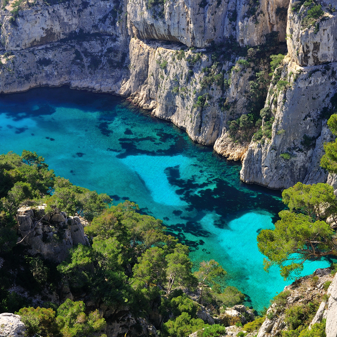 Calanque d’En-Vau’s crystalline waters and rugged cliffs make it one of the most photographed spots in the South of France