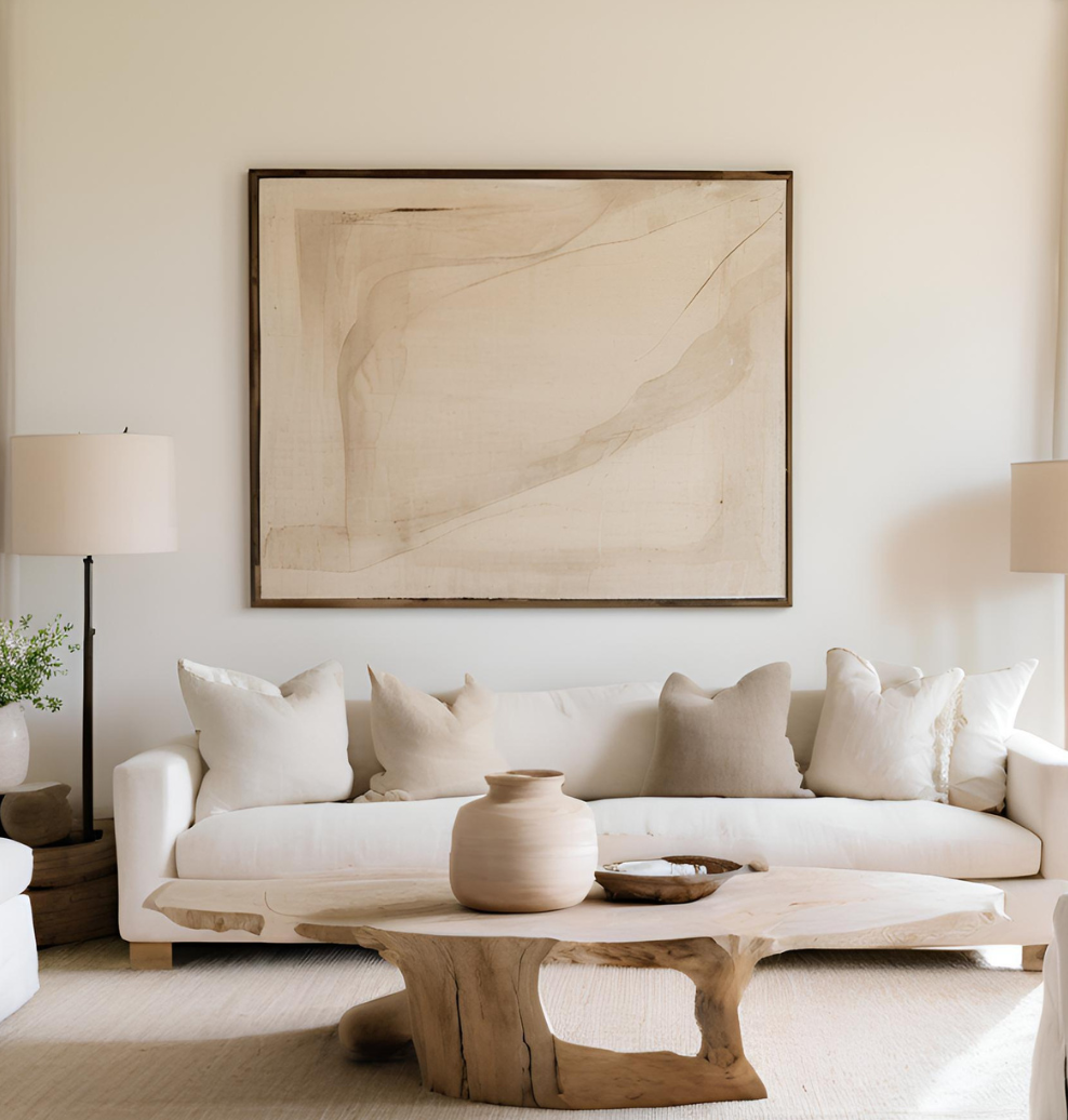 Elegant Riviera Living Room with Sculptural wood, abstract art, and plush neutrals