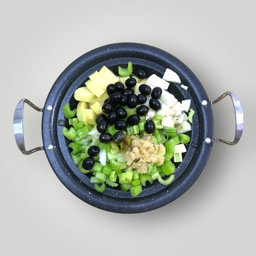 Mediterranean Fish Tagine Vegetable Preparation with Celery, Lemon, Black Olives and Potatoes